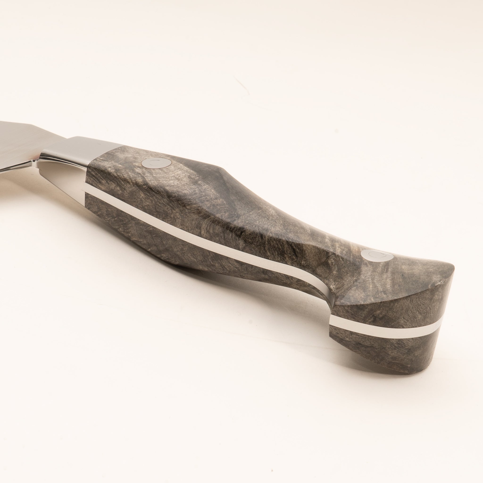 Detail photo of Classic 7" bread knife handle from Town Cutler with stainless steel blade and buckeye burl handle.