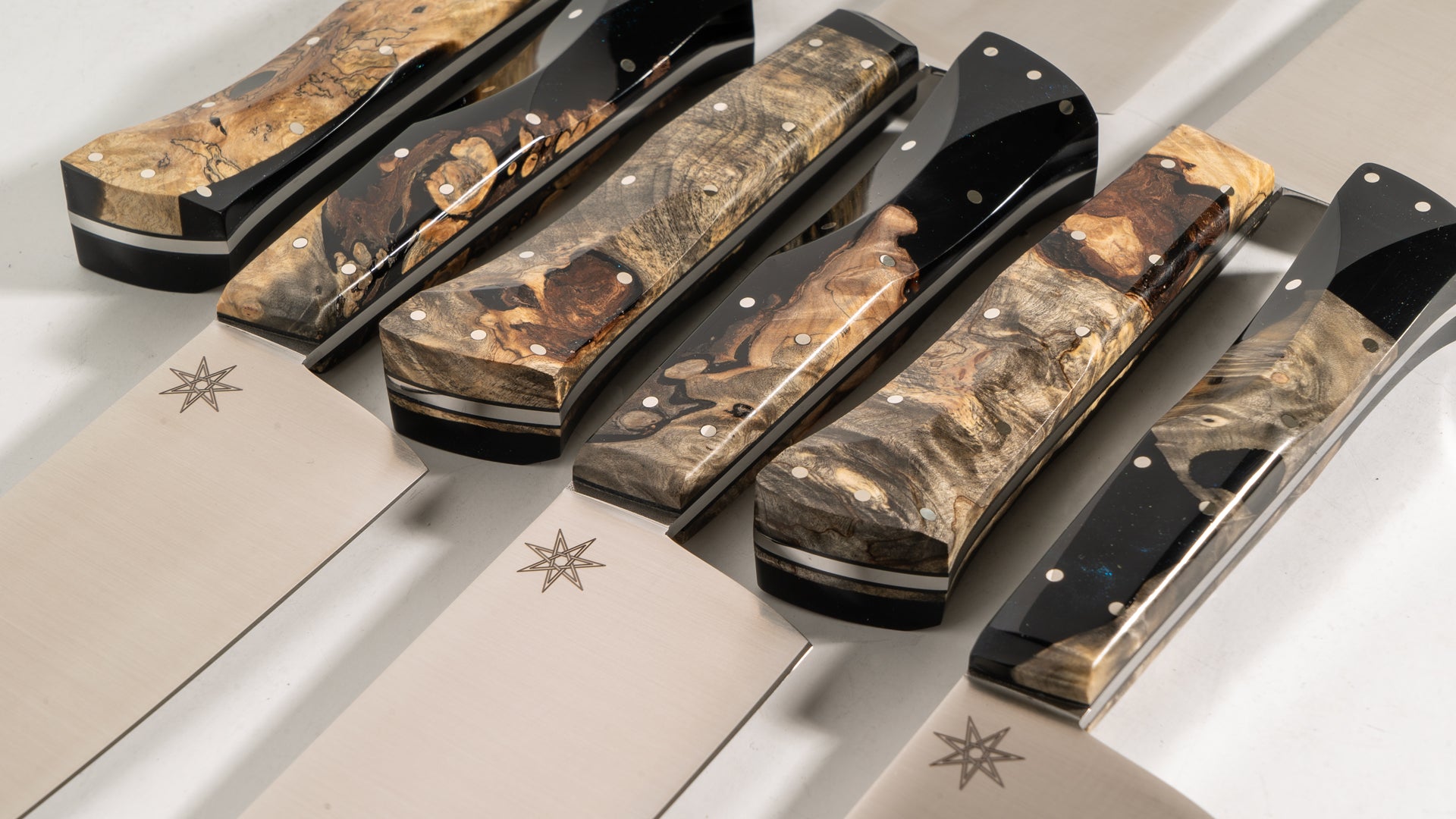 Detail closeup photo showing Town Cutler Desert Dawn Knives.