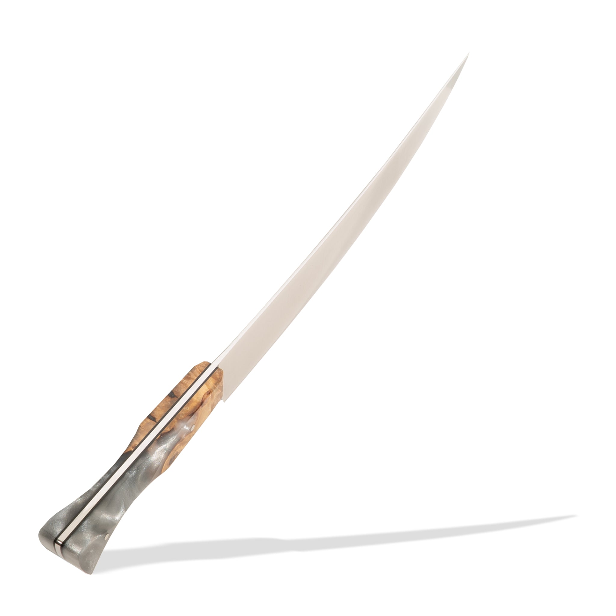 Detail photo of a scimitar butcher knife with a silver gray resin and wood handle on a white background
